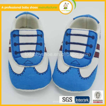 Fabrication 2015 Chaussures en tissu de coton bébé fabriquées à la main de conception la plus récente